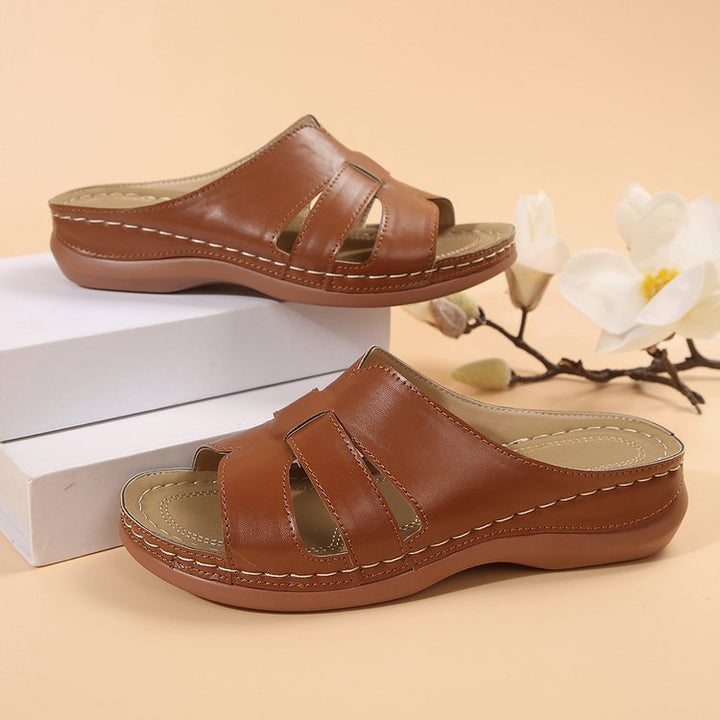 Comfortable slippers for ladies with ergonomic sole and trendy bands Lune London