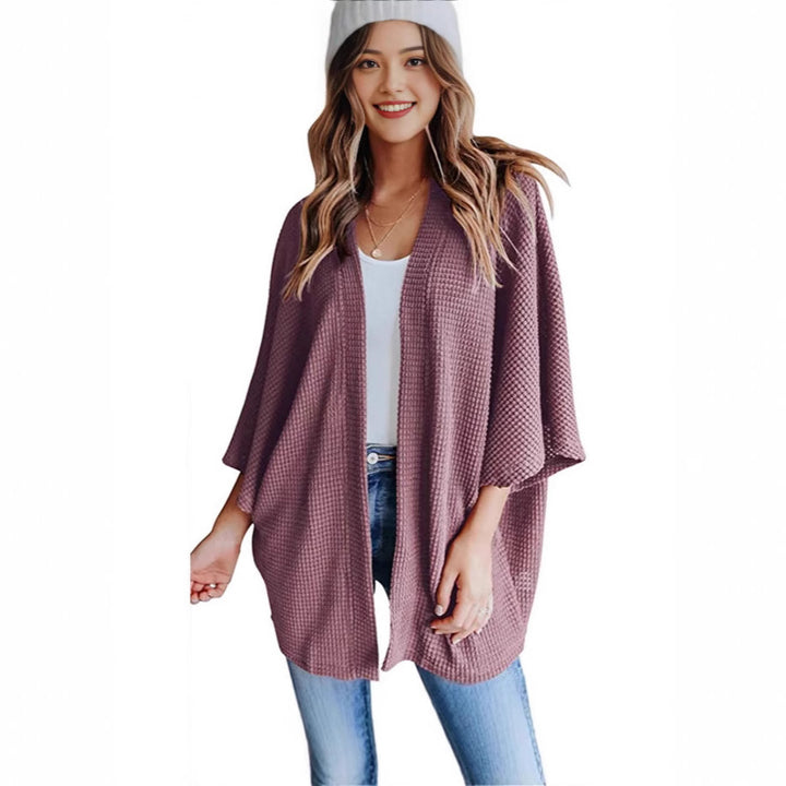 Ladies casual knit kimono with a loose fit and chic casual design