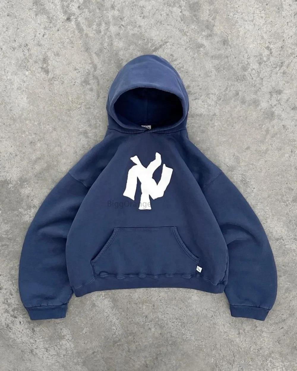 Sweat à capuche femme avec coupe oversize et poche kangourou pratique Chic & Stil