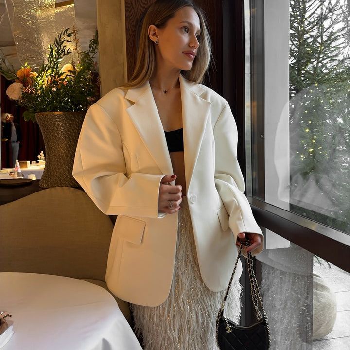 Oversized women's blazer jacket with unique button details and a relaxed fit Lune London