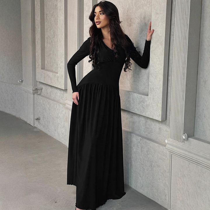 Elegant maxi dress for women with deep V-neckline and flowing cut Lune London
