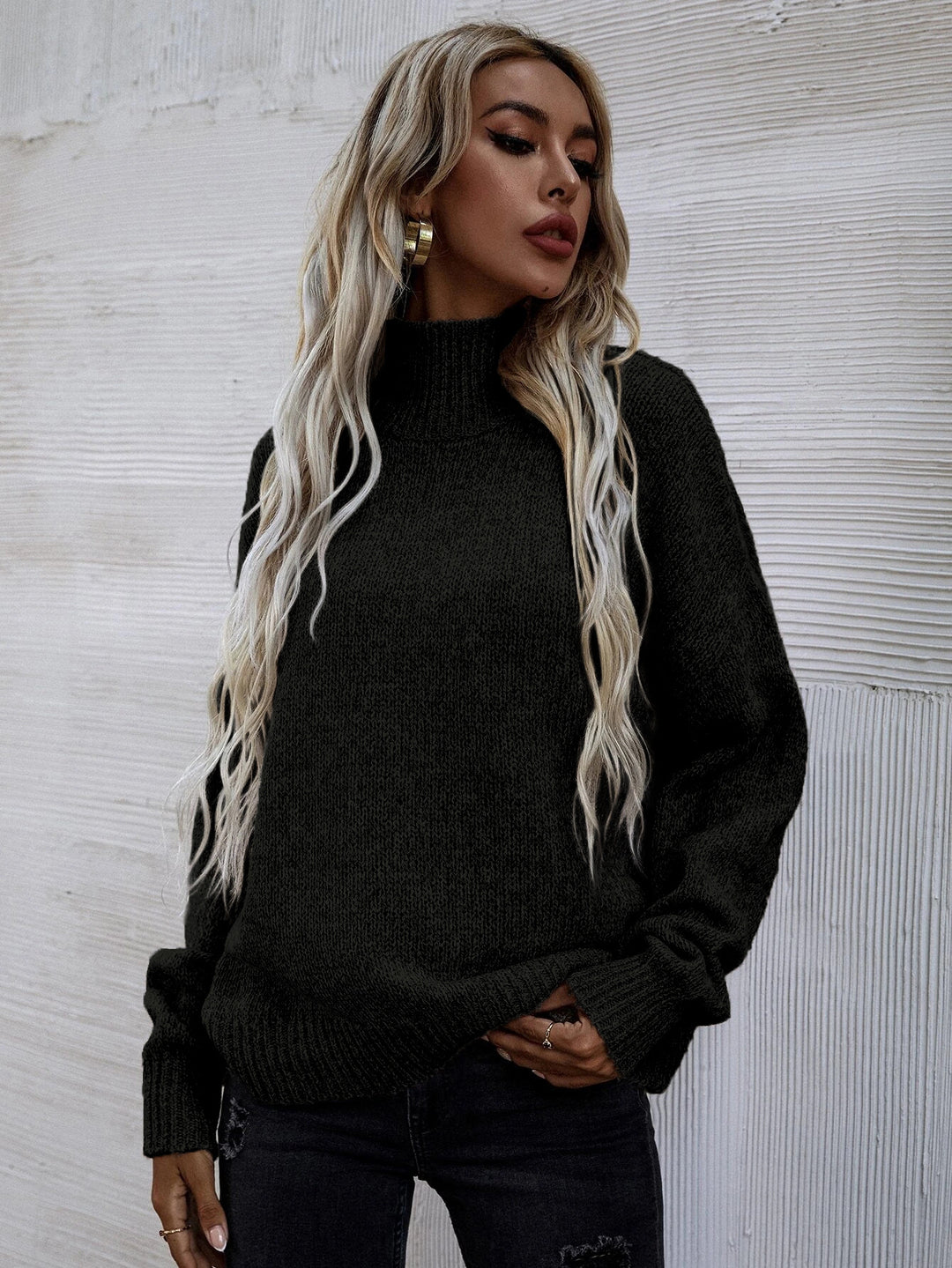 Oversized knitted sweater for women with high collar and soft textured pattern Lune London