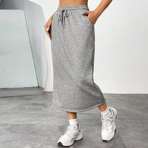 Midi jersey skirt for women with elastic waistband and welt pockets Lune London