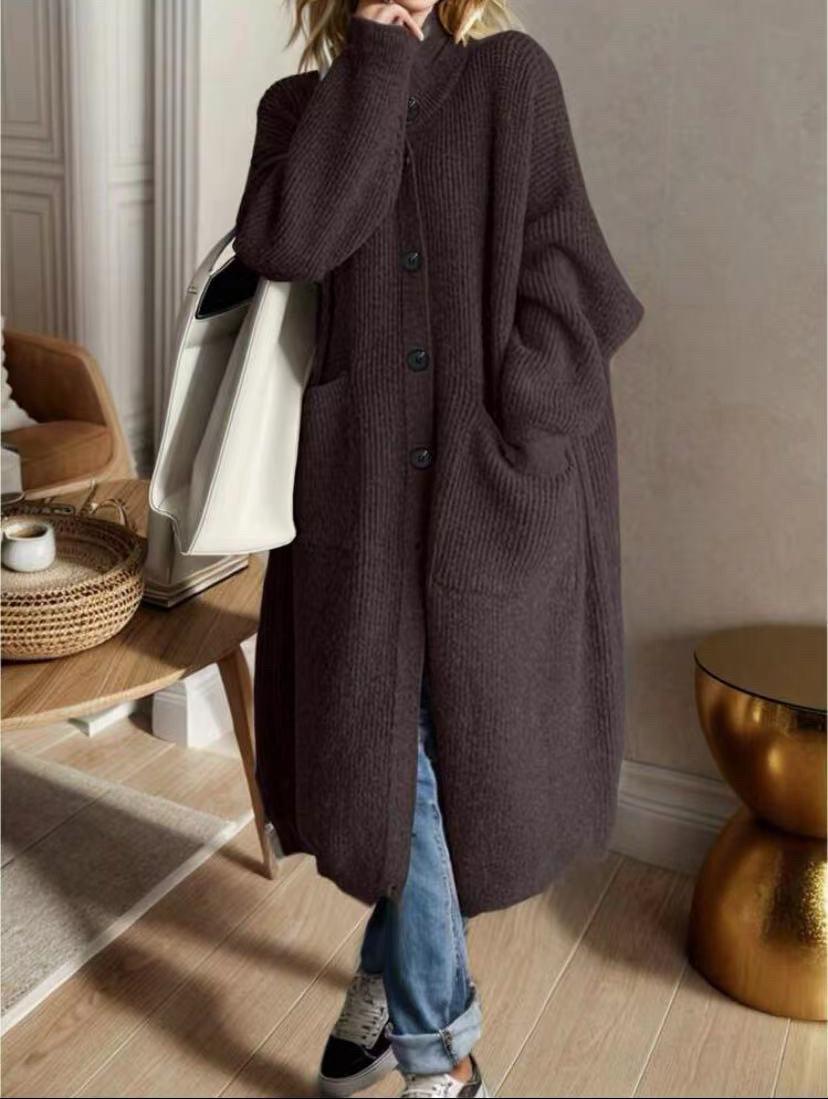 Trendy knitted jacket for women with generous pockets and chic button detail