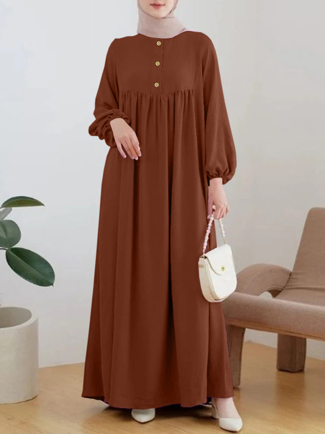 Lightweight maxi dress for women with comfortable buttoning and elegant puff sleeves Lune London