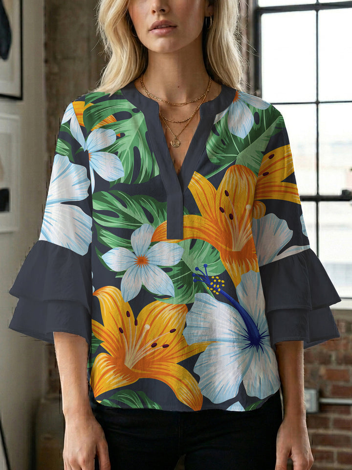 Ladies blouse with voluminous ruffled sleeves and floral print Lune London