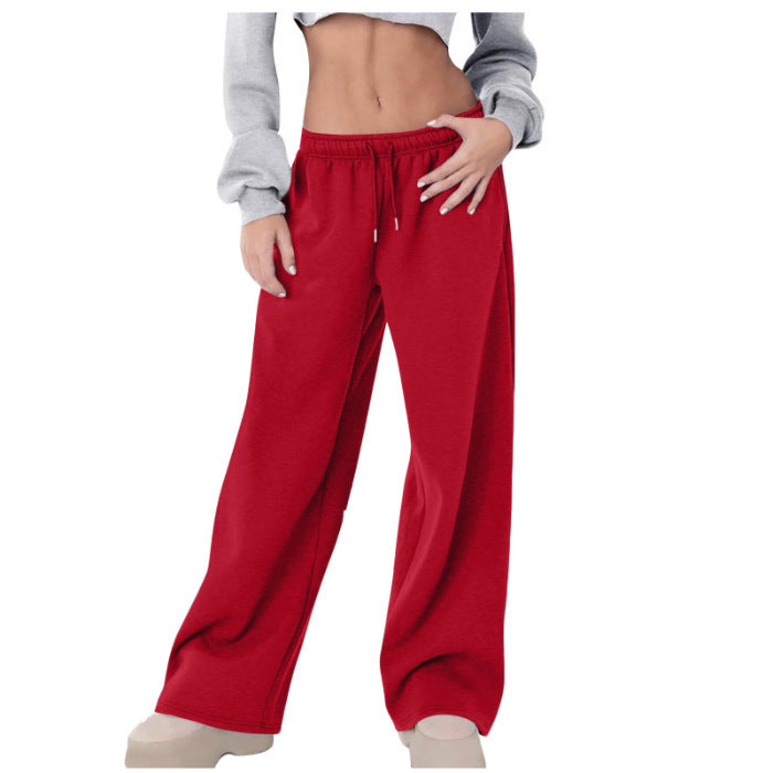 Women's loose casual pants with elastic waistband and side pockets Chic & Stil