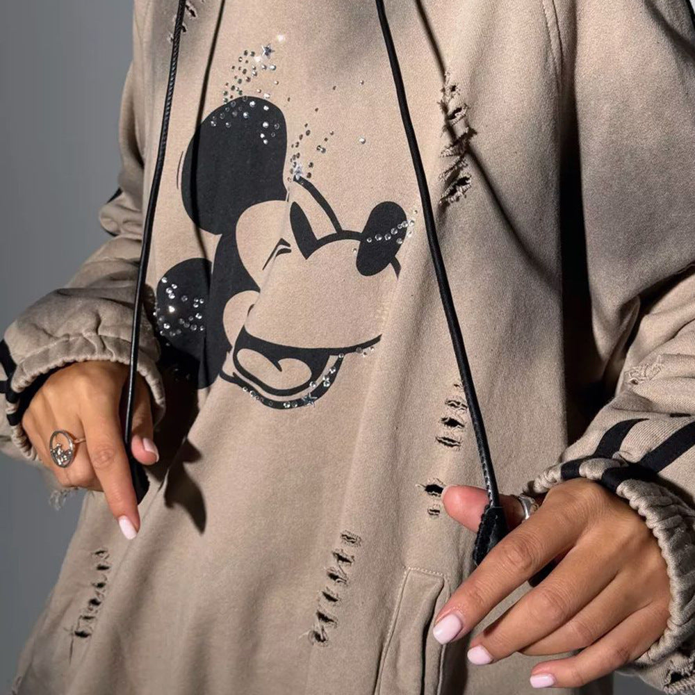 Oversized hoodie for women with trendy tear details and graphic print Lune London