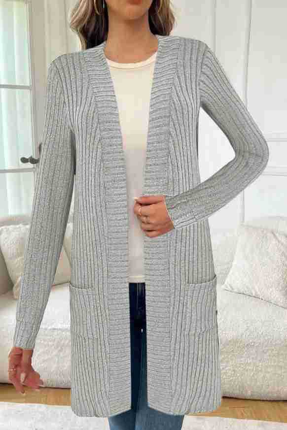 Knitted women's jacket with asymmetrical hem and practical pockets Lune London