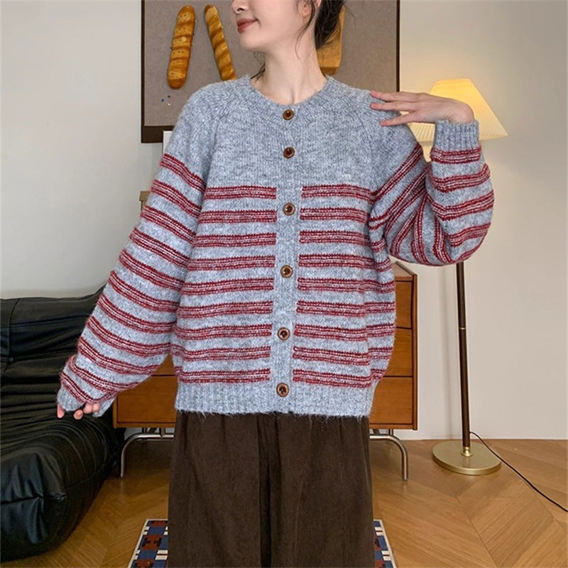 Ladies Chunky Knit Jacket with Modern Stripes and Chic Button Details and Style