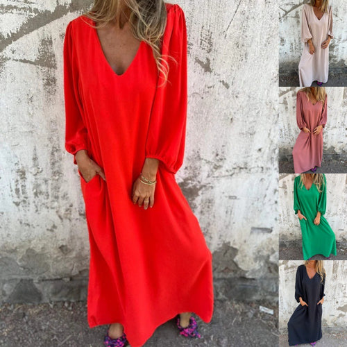 Maxi dress for women with deep V-neckline and practical side pockets Lune London