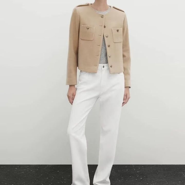 Short women's jacket with practical pockets and elegant button details Lune London