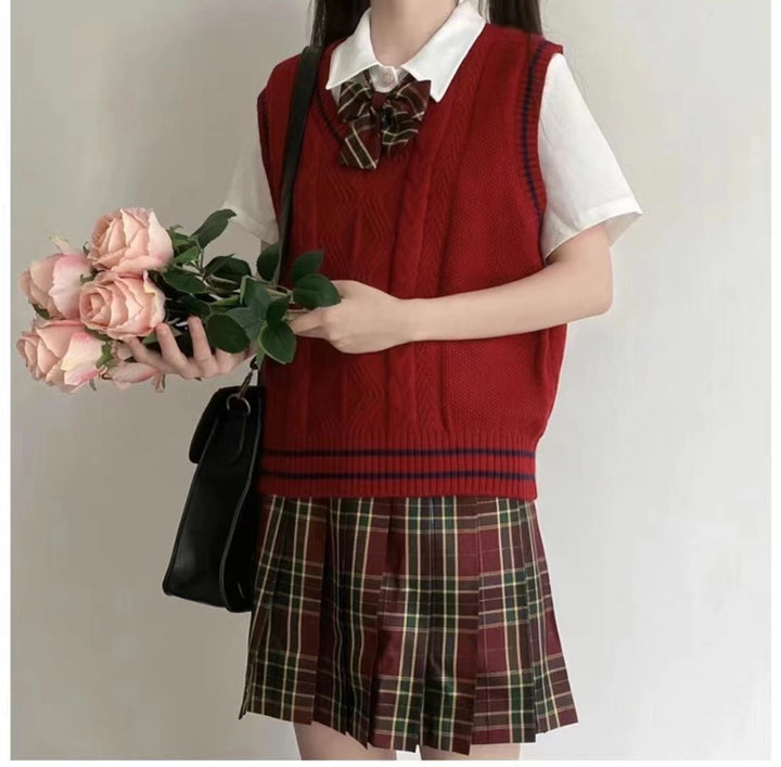 Knitted sweater for women with V-neck and geometric braid pattern Lune London