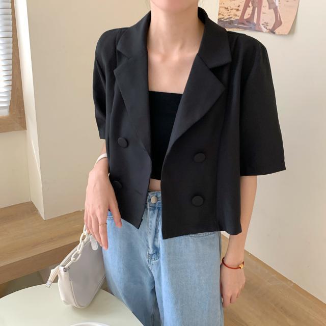 Women's short blazer with double button placket and fashionable cut