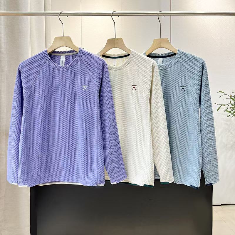 Chemise élégante à manches longues pour femmes avec un design texturé Chic & Stil