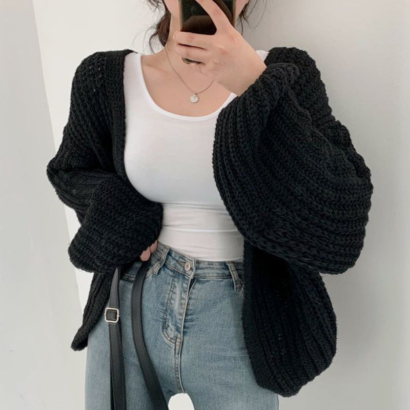 Ladies chunky knit cardigan with relaxed fit and voluminous sleeves Lune London