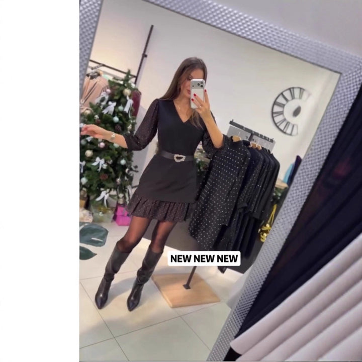 Robe élégante pour dames avec des manches bouffantes transparentes et une ceinture de fermeture Chic & Stil