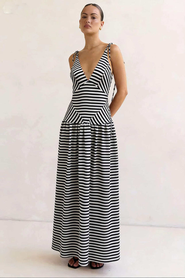 Women's maxi dress with deep V-neckline and elegant striped design