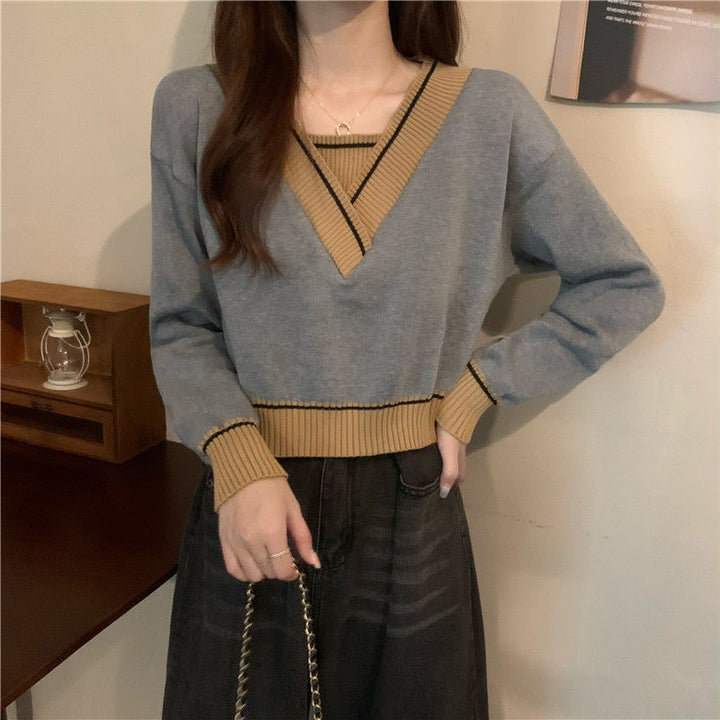 Pull féminin à la mode en V avec détails contrastés Chic & Stil