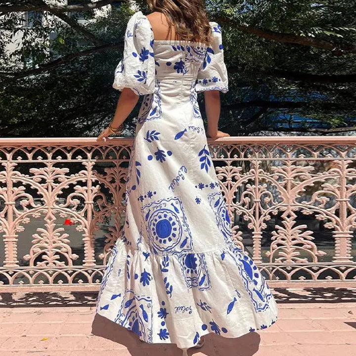 Robe maxi femme avec manches bouffantes et détails imprimés floraux Chic & Stil