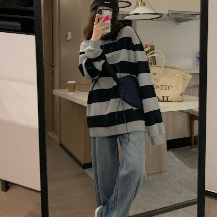 Women's casual knit sweater with wide stripes and cozy oversized fit