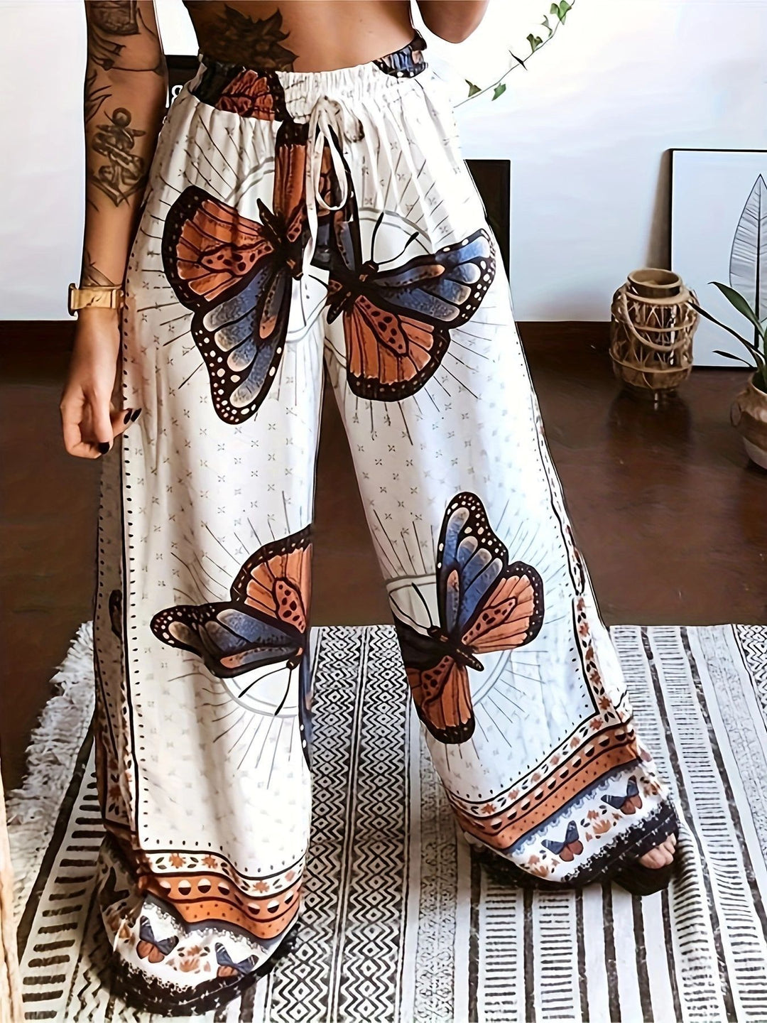 Pleated women's trousers with floral pattern and elastic waistband Lune London