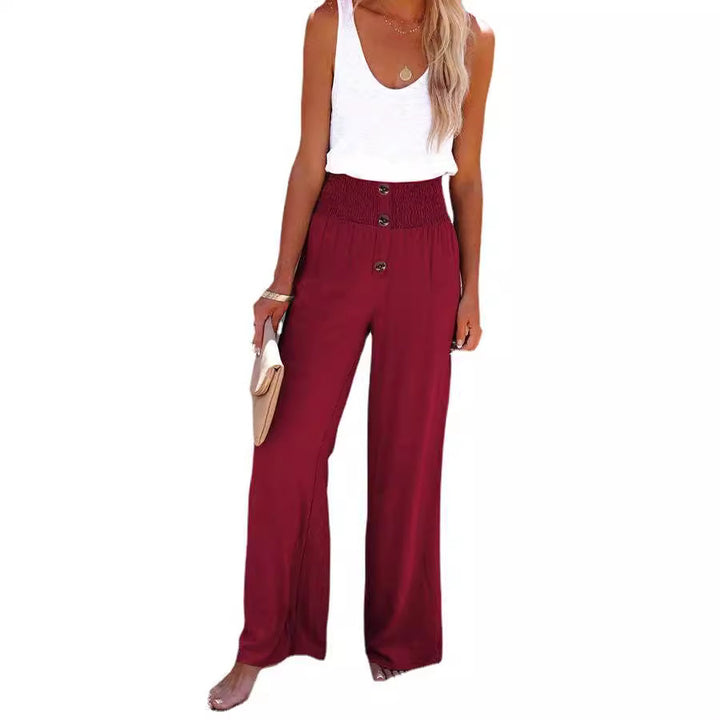 Loose summer trousers for women with elastic waist and button details Lune London