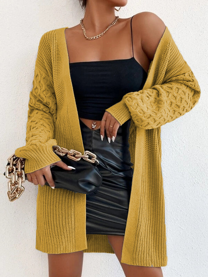 Women’s knitted jacket with refined twisted pattern and relaxed fit Lune London