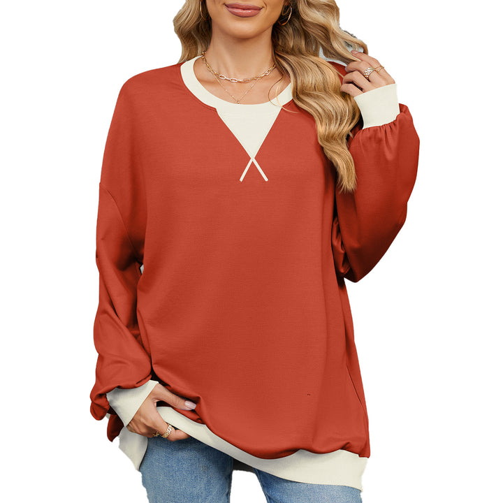 Casual oversized sweatshirt for women with a modern V-neck and chic elegant cuffs