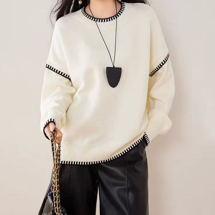 Pull confortable pour femme avec ourlet texturé et accents modernes Chic & Stil