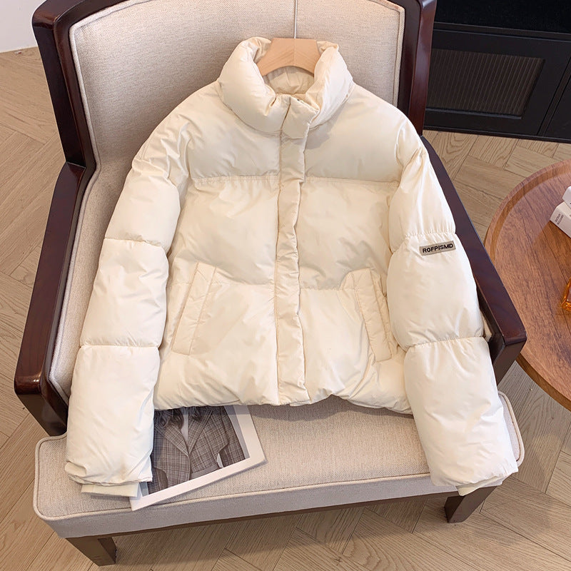 Short Puffer jacket for women with high collar and practical pockets Lune London