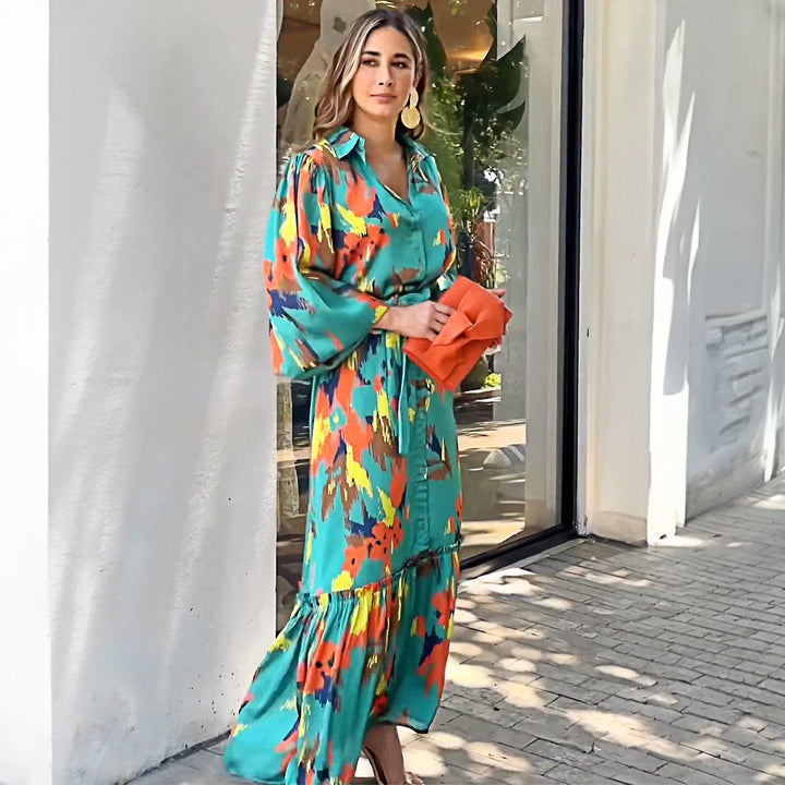 Airy maxi dress for women with a colorful graphic design and elegant ruffle details Lune London