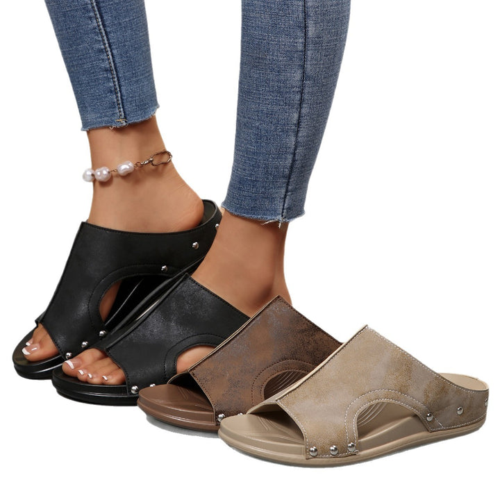 Comfortable slip-on sandals for ladies with a trendy cut-out design and an elegant rhinestone pattern Lune London