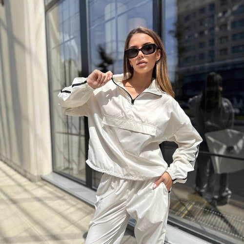 Ladies functional sports suit with high collar and elastic cuffs Lune London