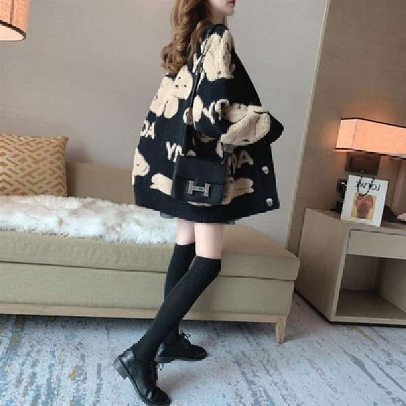 Women's oversized knit sweater with playful pattern and comfortable fit Lune London