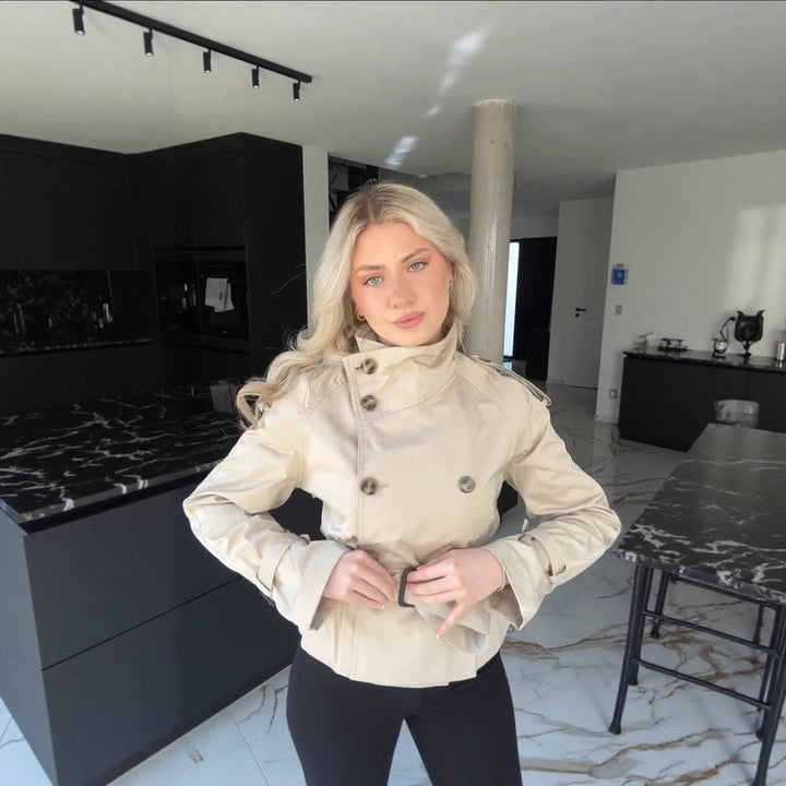 Modern trench coat for women with high collar and practical side pockets Lune London