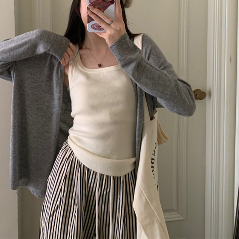 Women's casual knitted cardigan with a loose fit and fine details Lune London