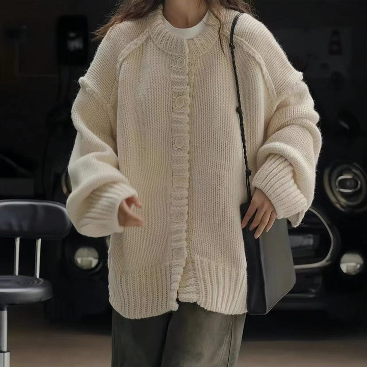 Oversized knitted jacket for women with special button details and wide sleeves Lune London