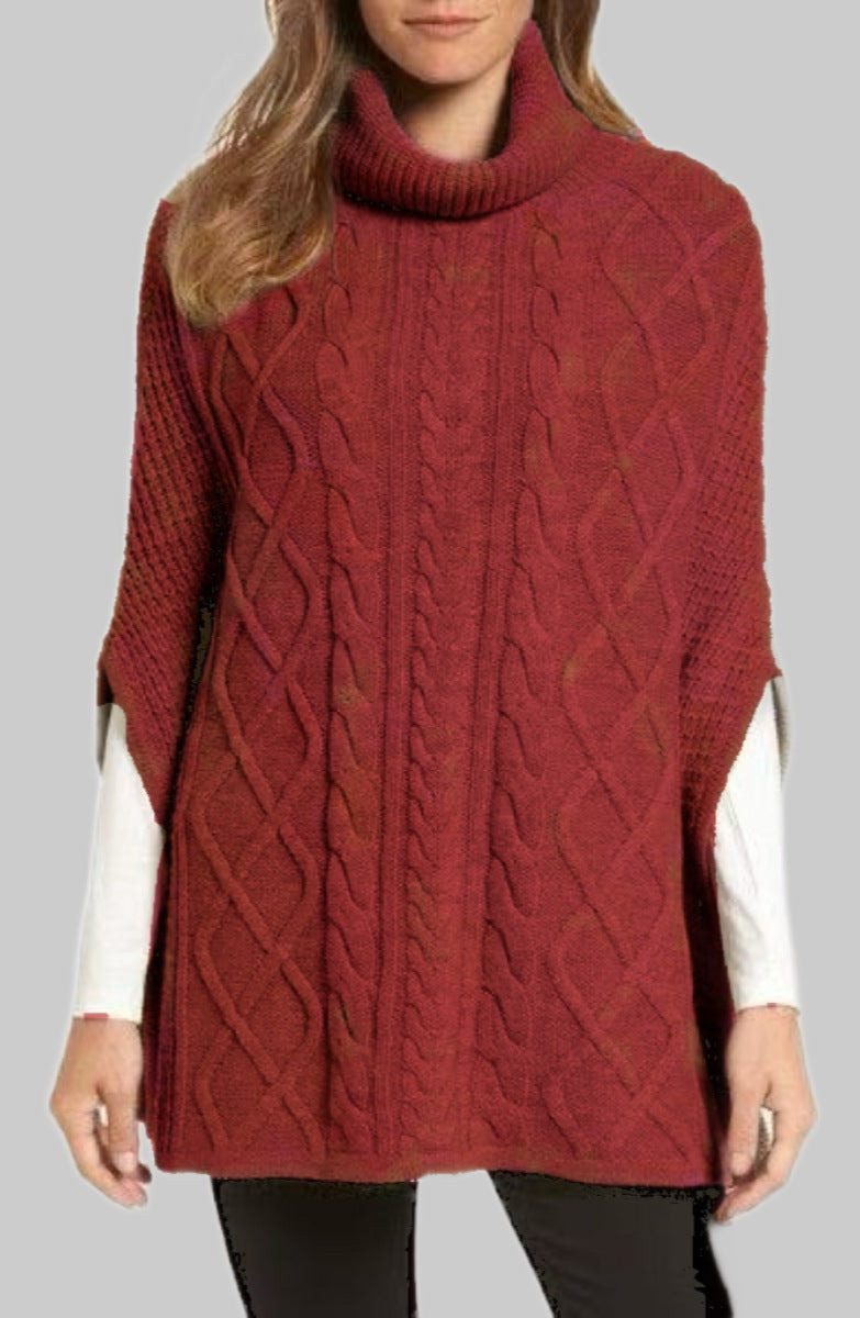 Knitted poncho for women with high collar and classic cable knit pattern Lune London
