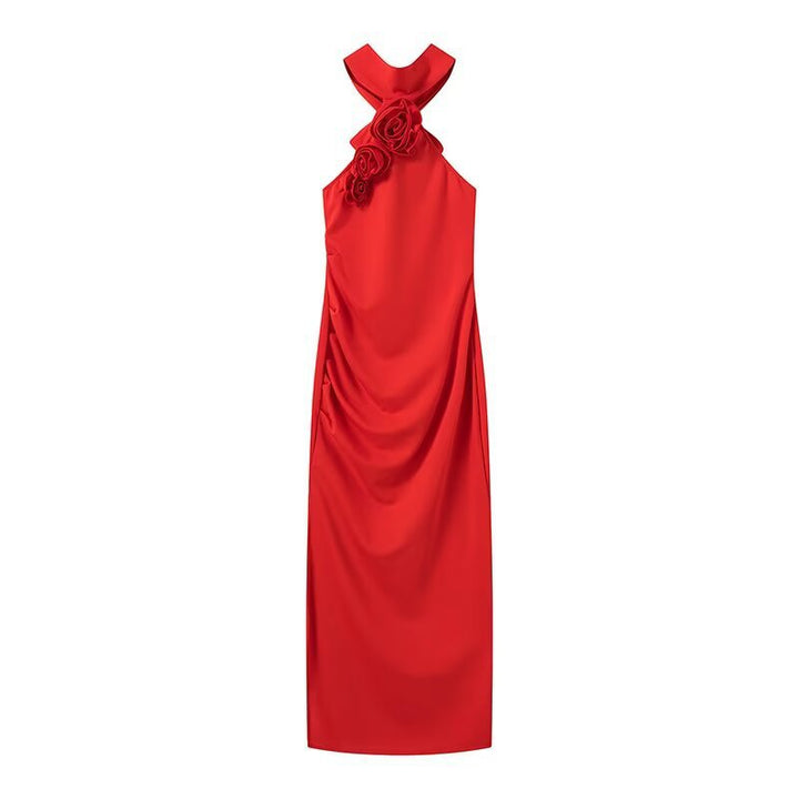 Maxi dress for women with a playful halter neck and an elegant bow. Lune London