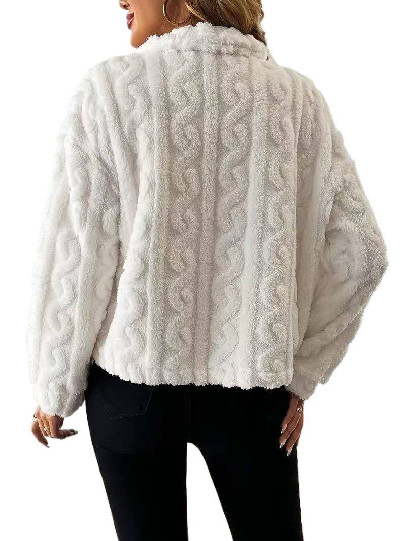 Women’s plush jacket with button closure and striped design.