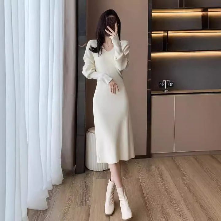 Knit dress for women with deep V-neck and specially designed structure Lune London