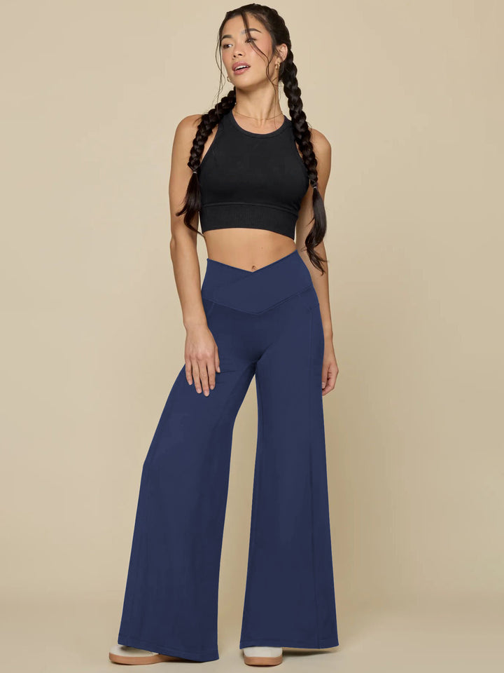 Elegant high-waisted casual trousers for women, with wide legs and practical pockets Lune London