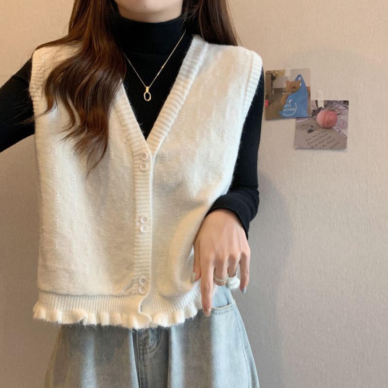 Gilet en tricot pour femme avec ourlet à volants ludiques Chic & Stil
