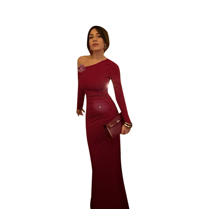 Ladies elegant long-sleeved evening dress with asymmetric neckline and figure-flattering design
