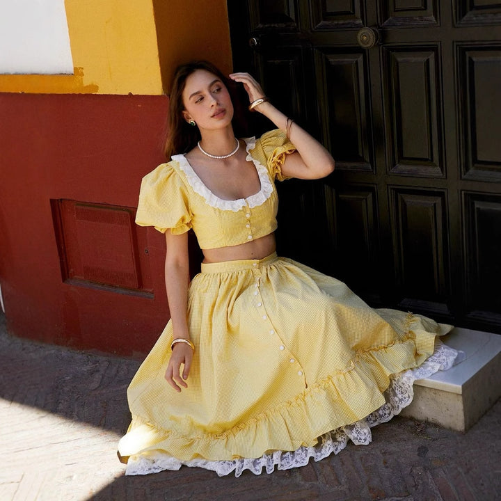 Midi skirt for women with ruffled hem and elegant lace trim Lune London