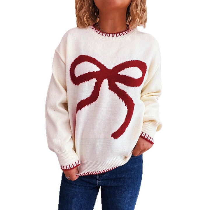 Pull femme avec application de nœud fantaisie et coupe moderne Chic & Stil