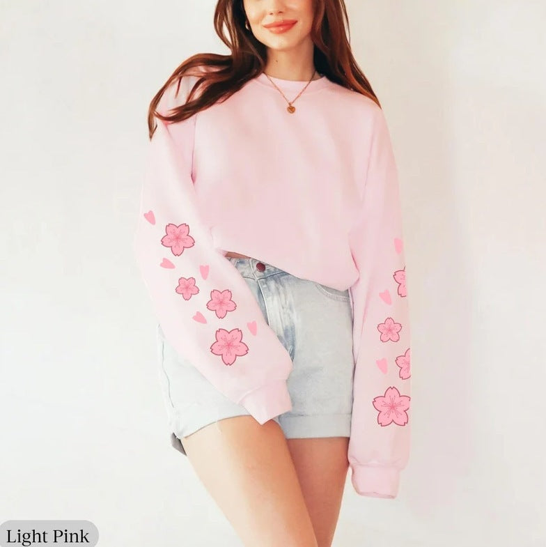 Sweatshirt pour femmes avec design floral et manches amples Chic & Stil