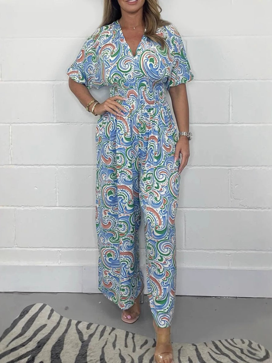 Lady Fluid jumpsuit with elegant paisley pattern and Lune London cinching