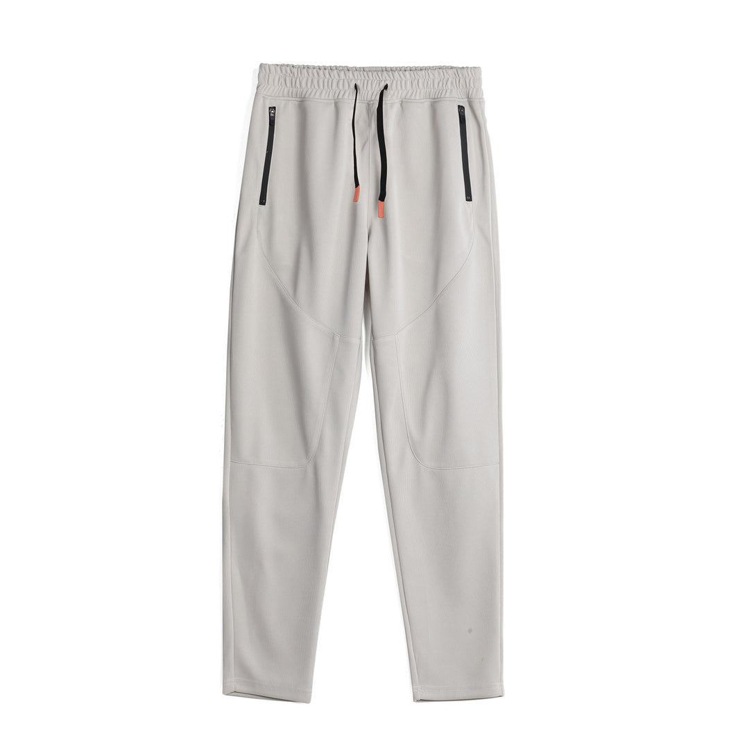Men's sporty jogging pants with an innovative breathable structure and practical zippered pockets Lune London